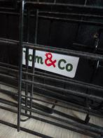 Metalen kooi, Ophalen, Zo goed als nieuw