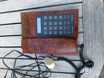 Vintage telefoon wortelhout imitatie beschikbaar voor biedingen