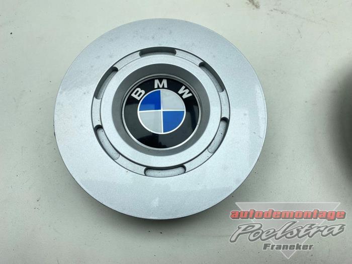 Enjoliveur moyeu d'un BMW 7-Serie, Autos : Pièces & Accessoires, Autres pièces automobiles, BMW, Utilisé, 3 mois de garantie, Enlèvement ou Envoi