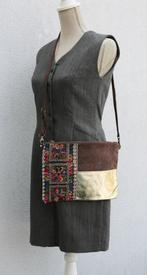 Nieuw tasje in leder - mooi en origineel, Handtassen en Accessoires, Tassen | Damestassen, Ophalen of Verzenden, Nieuw, Bruin