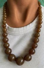 Bakeliet ketting, Handtassen en Accessoires, Kettingen, Ophalen, Gebruikt, Bruin, Overige materialen