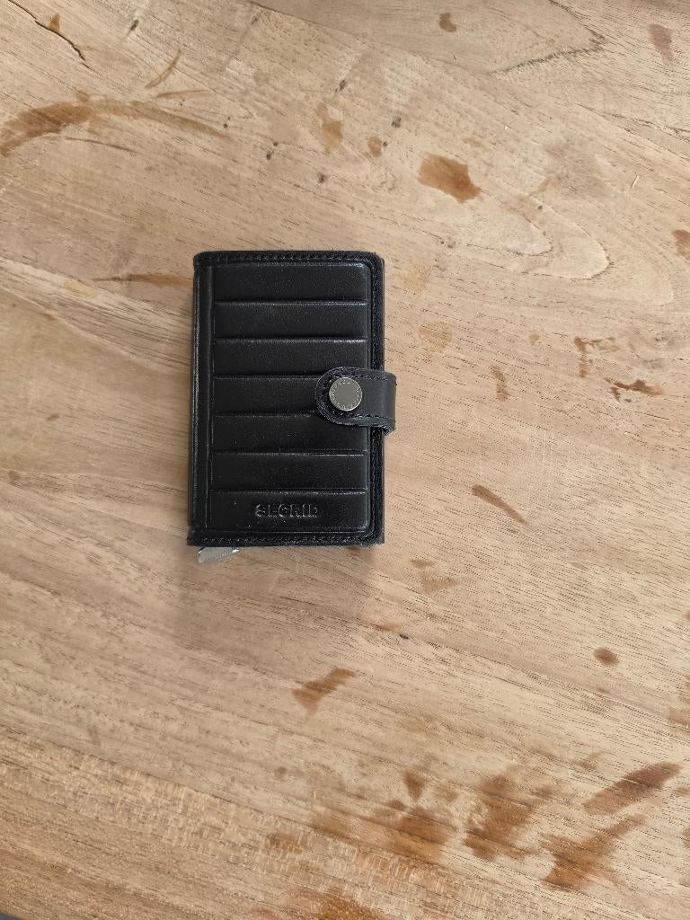 Portefeuille Secrid, Zwart, Zo goed als nieuw, Leder, Ophalen