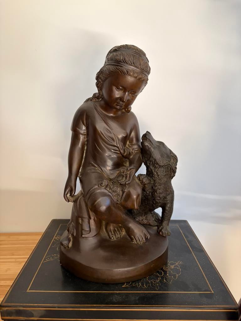 Bronzen berld vrouw met hond, Ophalen