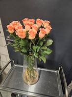 Vaas met (nep)rozen, Ophalen