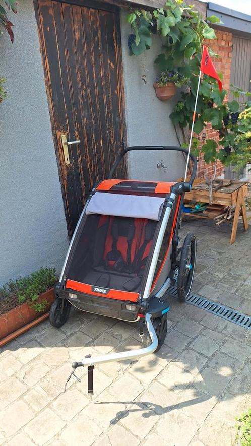 Fietskar Thule Chariot Cross double

Oranje, Fietsen en Brommers, Fietsaccessoires | Aanhangwagens en Karren, Zo goed als nieuw