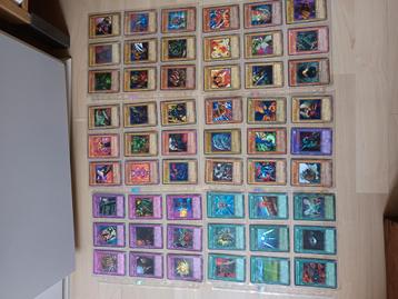 67 yu-gi-oh kaarten in folders beschikbaar voor biedingen