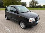 Hyundai Atos 998 cc benzine gekeurd 102038 km, Auto's, Voorwielaandrijving, 4 cilinders, Overige bekleding, Zwart