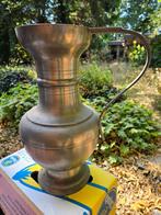 Tinnen vaas, Ophalen