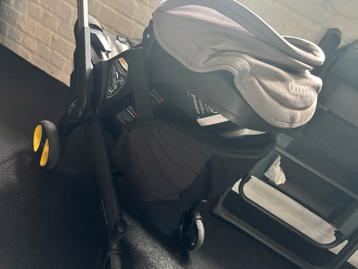 Poussette Doona + isofix disponible aux enchères