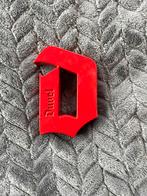 Duvel flesopener “Rode D”, Verzamelen, Biermerken, Ophalen of Verzenden, Zo goed als nieuw, Flesopener, Duvel