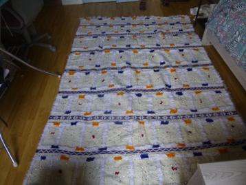 Tapis artisanal tout neuf 1,68/ 2,45 m