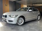 BMW 116 i Urban Line | Cruise Control | Navi | Sensoren |, 100 kW, Adaptieve lichten, Zwart, 5 deurs
