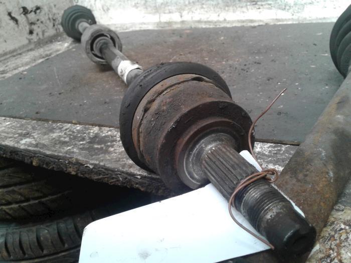 Aandrijfas rechts-voor van een Opel Corsa, Auto-onderdelen, Remmen en Aandrijving, Opel, Gebruikt, 3 maanden garantie, Ophalen of Verzenden