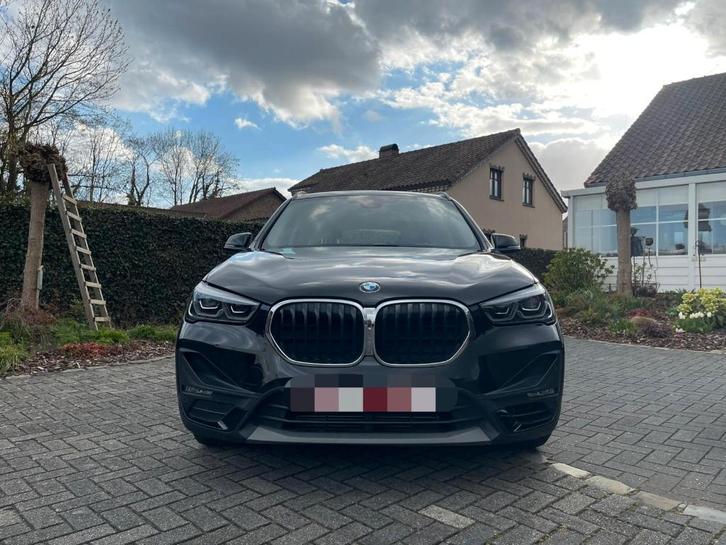 BMW X1 xDrive25e, Auto's, BMW, Particulier, X1, Bluetooth, Hybride Elektrisch/Benzine, SUV of Terreinwagen, Automaat, Zwart, Zwart