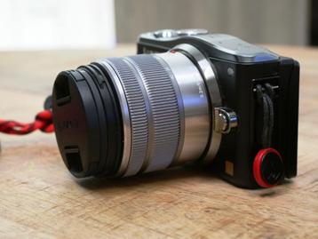 Lumix GF6 + Lumix 14-42mm in perfecte staat beschikbaar voor biedingen