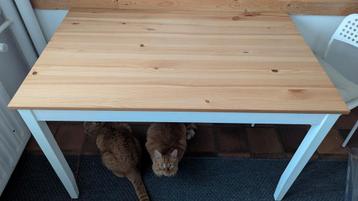IKEA eettafel - massief houten blad, witte poten beschikbaar voor biedingen