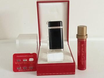 Dupont : Briquet Cartier laqué chinois de couleur noire.  disponible aux enchères