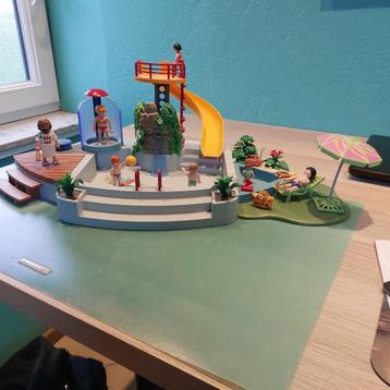 playmobil 4858 zwembad met glijbaan, Kinderen en Baby's, Speelgoed | Playmobil, Ophalen of Verzenden, Zo goed als nieuw, Complete set