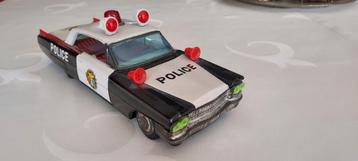 oude speelgoedauto Politiewagen Cadillac, weggeefprijs beschikbaar voor biedingen