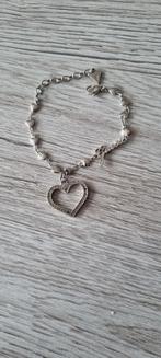 Armband met hart van guess, Ophalen