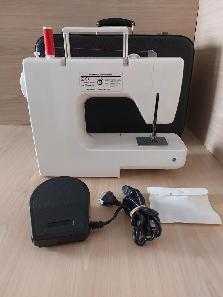 Machine à coudre Toyota, Ophalen, Naaimachine