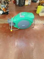 Hozelock automatische haspel, Ophalen