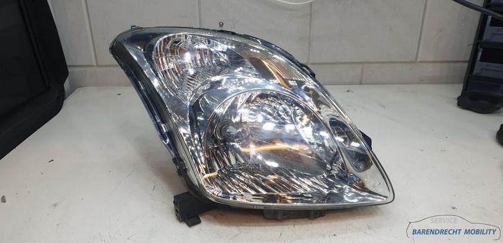 Koplamp Suzuki Swift rechts 35100-62J11 passagierskant origi, Auto-onderdelen, Verlichting, Suzuki, Gebruikt