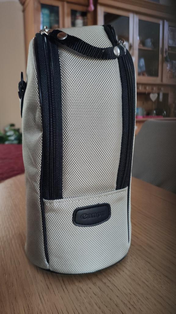 Lenshouder CANON, voor 2 halve liter flessen. Mooi verhaal., Sport en Fitness, Drinkbussen, Zo goed als nieuw, Ophalen of Verzenden