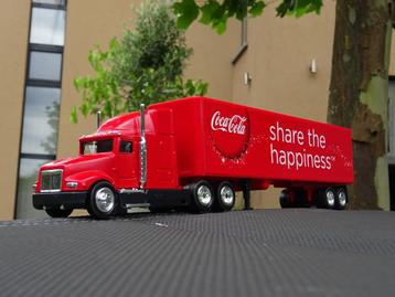 Amerikaanse Coca-Cola vrachtwagen met oplegger beschikbaar voor biedingen