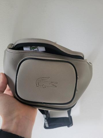 Sac banane Lacoste gris  beschikbaar voor biedingen