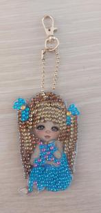 Porte-clés en strass - Poupée (1), Ophalen of Verzenden, Nieuw, Knuffel of Figuurtje