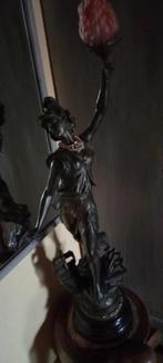 grande statue, Ophalen