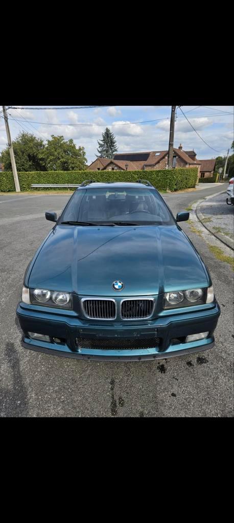 Bm E36 touring 323i packM, Auto's, BMW, Particulier, Elektrische ramen, Lederen bekleding, Open dak, Automaat, Zwart, Zwart, Leder
