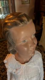 Etalagepop kind, Ophalen