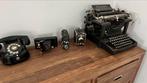 Anthieke typemachine en fototoestellen, Enlèvement