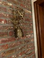 Bronzen bel, Ophalen