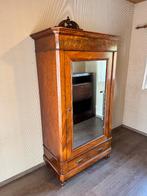 Antieke spiegelkast, Enlèvement