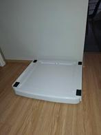 Tussenstuk voor tussen wasmachine en droogkast, Ophalen