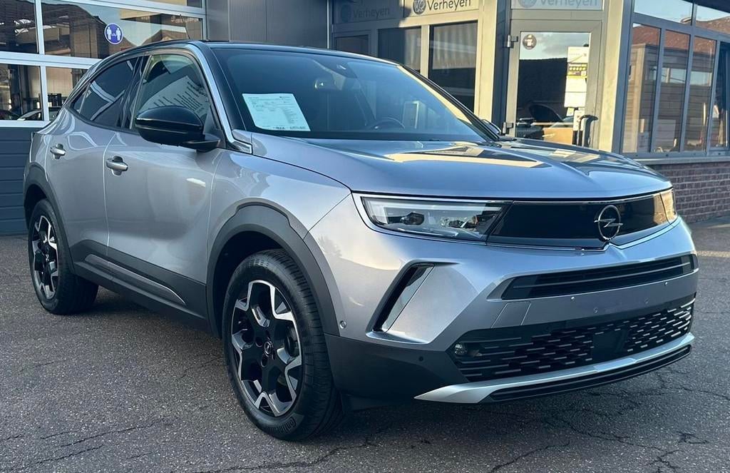 Opel Mokka E Elektrisch136Pk UltimateEdition+Camera +Adaptiv, Auto's, Opel, Monovolume, Gebruikt, Zwart, 136 pk