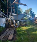 Stel een stevige kruiwagen van een metselaar samen, Ophalen