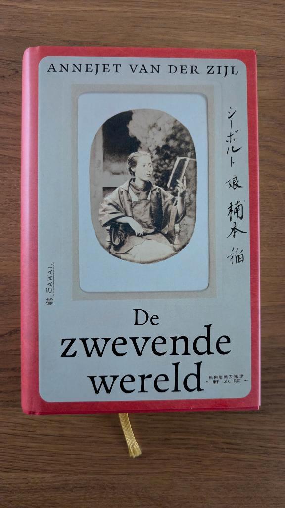 De zwevende wereld (hardcover met leeslint), Livres, Livres Autre, Comme neuf, Enlèvement