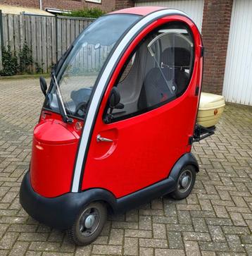 Nette Overdekte scootmobiel met hand en voetgas merk Mango