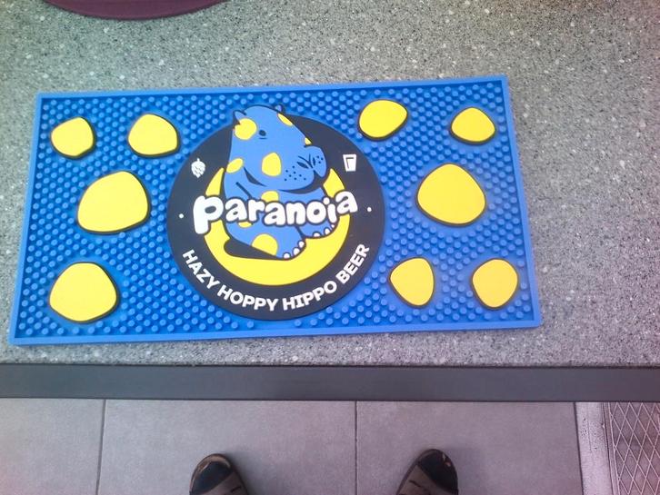 Rubberen toogmat Paranoia., Collections, Marques de bière, Neuf, Autres types, Autres marques, Enlèvement ou Envoi