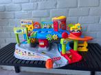 Vtech Toet Toer autos garage, Kinderen en Baby's, Speelgoed | Vtech, Ophalen, Zo goed als nieuw