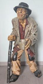 Ancienne statue d'un mendiant, Enlèvement