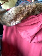 damesvest 44 met kap, Ophalen