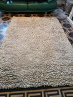 Tapis en laine, Ophalen, Gebruikt