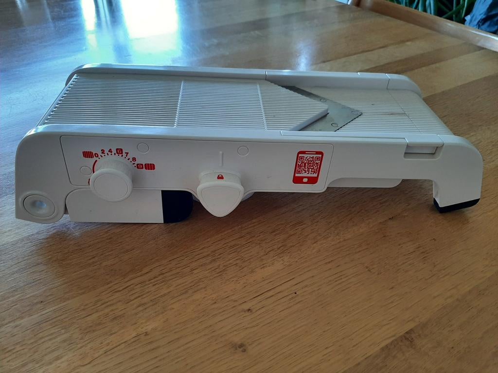 Mandoline Tupperware, Ophalen