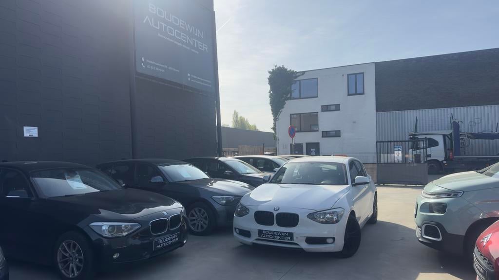 Bmw 1 Serie 116i 1.6Benzine 2012 157.xxxkm/Carplayy,Android, Automaat, Zwart, Wit, https://public.car-pass.be/vhr/4d40ad46-b5e4-413b-bcb0-d481c80b19a8