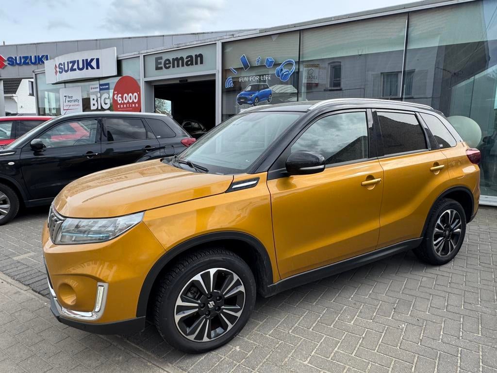 Suzuki Vitara 1400 Turbo benzine GLX mild hybrid 2021, Auto's, Suzuki, Voorwielaandrijving, Euro 6, Geel, Bedrijf
